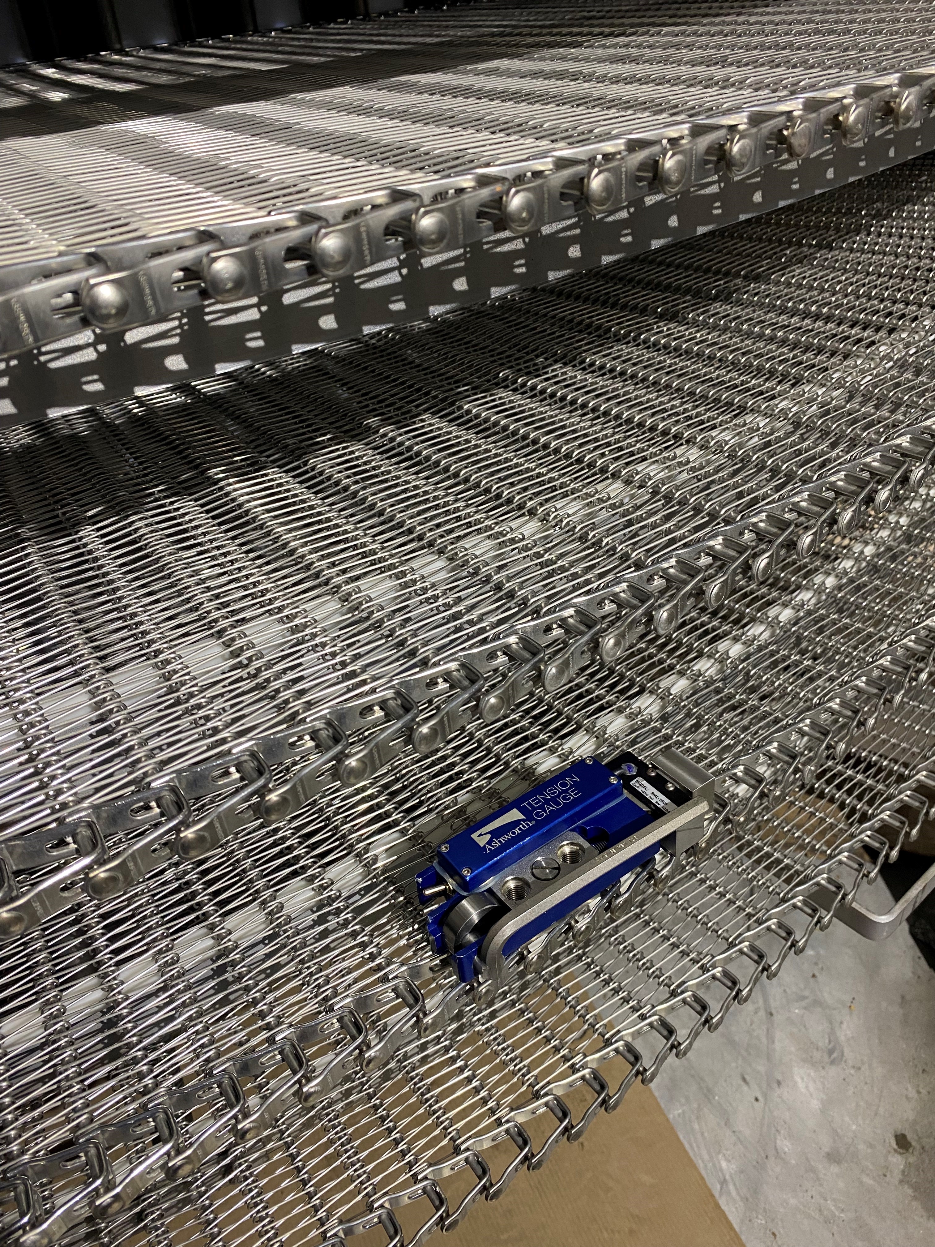 Spiral belt tension measurement